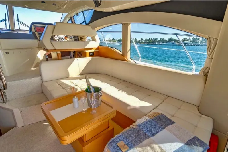 Slide: The Image of Luxurious interior of 2013 Azimut 45 yacht with ocean view and elegant seating area. - 15