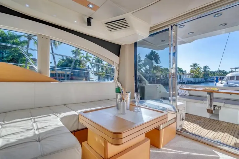 Slide: The Image of Luxurious interior of 2013 Azimut 45 yacht with elegant seating and scenic marina view. - 17