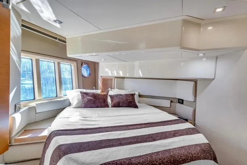 Slide: The Image of Luxurious bedroom interior of 2013 Azimut 45 yacht with elegant bedding and large windows. - 19