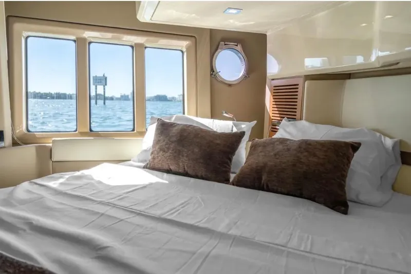 Slide: The Image of Luxurious bedroom interior of 2013 Azimut 45 yacht with ocean view windows. - 20