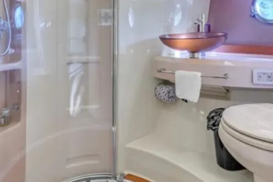 Slide: The Image of Luxurious bathroom in 2013 Azimut 45 yacht with modern fixtures and elegant design. - 22