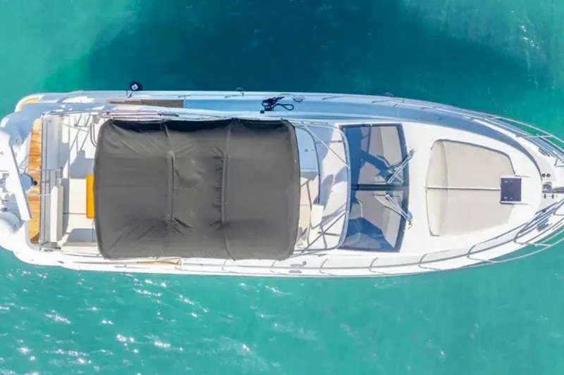 Slide: The Image of Aerial view of 2013 Azimut 45 yacht on turquoise water. - 3