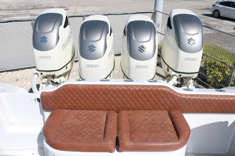 Slide: The Image of Four Suzuki 350 outboard engines on a 2008 Yellowfin 42 Offshore boat. - 25