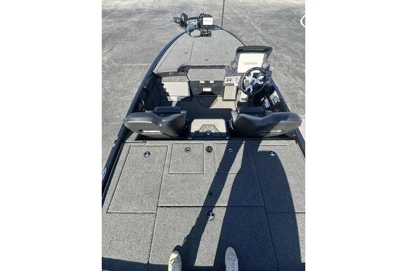 Slide: The Image of 2026 Nitro Z19 XL Pro boat interior with steering console and seating. - 4