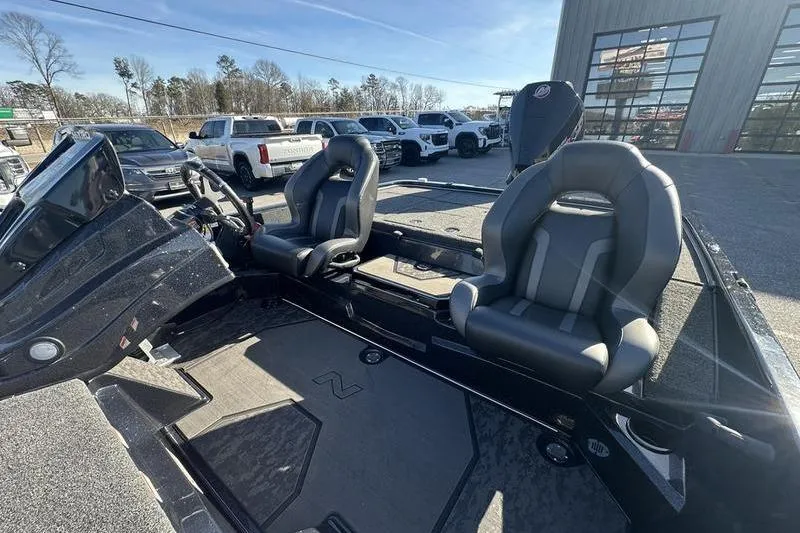 Slide: The Image of 2026 Nitro Z19 XL Pro boat interior with dual seats and steering console. - 6