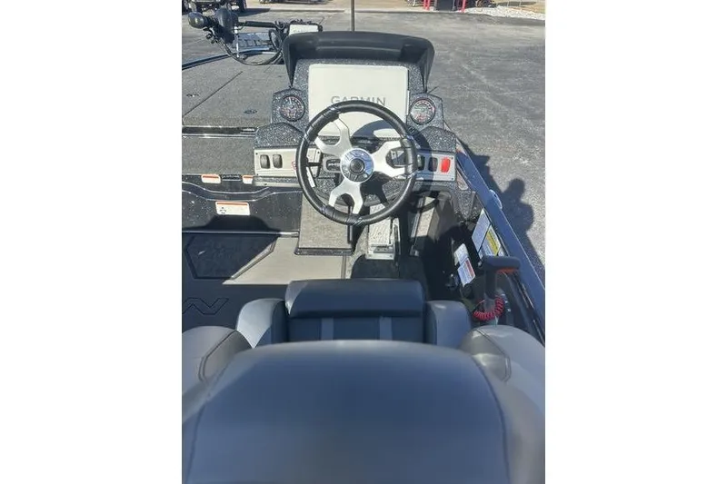 Slide: The Image of 2026 Nitro Z19 XL Pro boat cockpit with Garmin navigation system and steering wheel. - 7