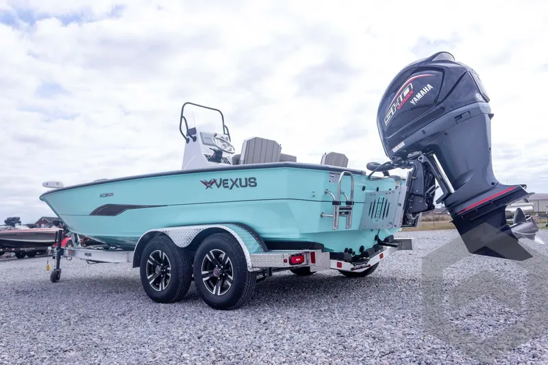Slide: The Image of 2026 Vexus ACX 2150 boat with Yamaha engine on a trailer, parked on gravel. - 12