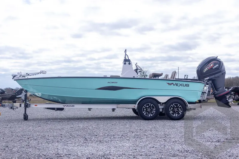 Slide: The Image of 2026 Vexus ACX 2150 boat on trailer, featuring sleek design and powerful engine. - 13