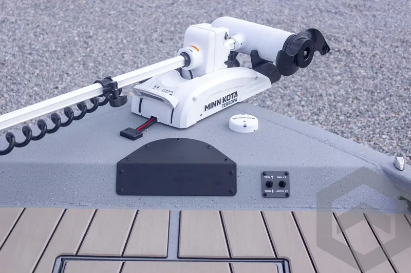 Slide: The Image of 2026 Vexus ACX 2150 boat with Minn Kota Terrova trolling motor on deck. - 29