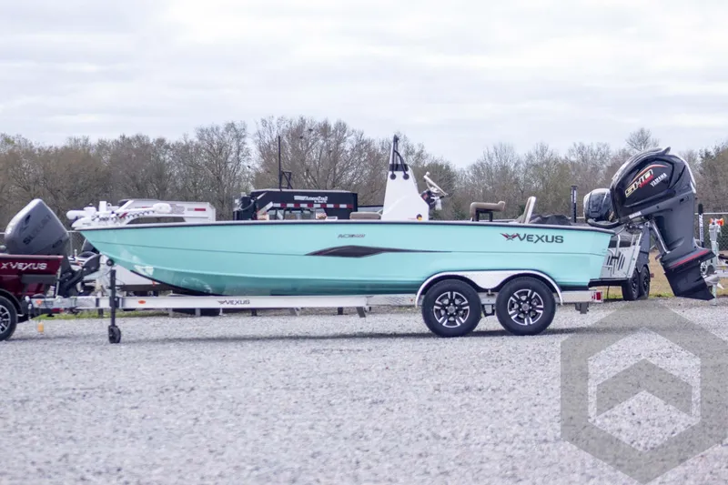 Slide: The Image of 2026 Vexus ACX 2150 boat on trailer with Yamaha engine, parked outdoors. - 3