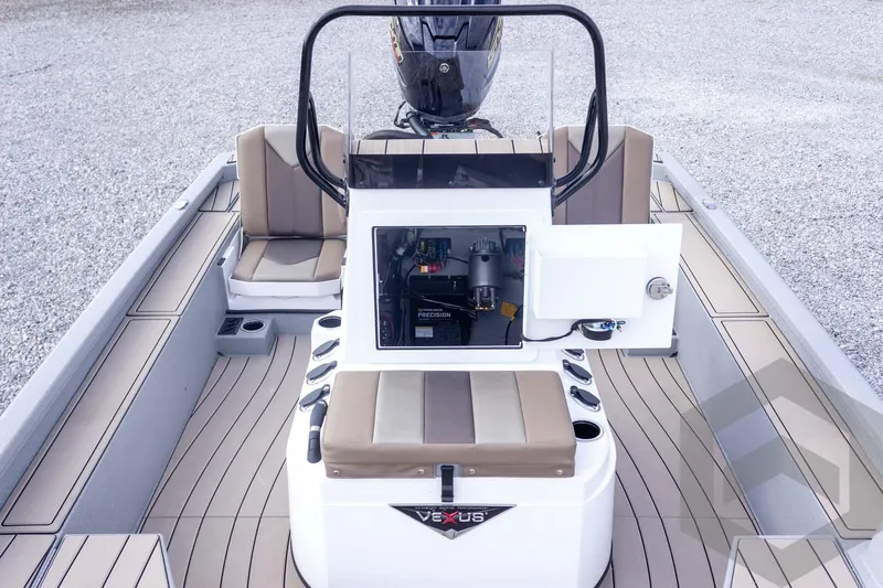Slide: The Image of 2026 Vexus ACX 2150 boat interior with open console and seating. - 32