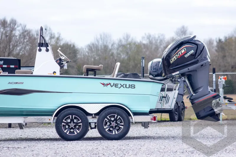 Slide: The Image of 2026 Vexus ACX 2150 boat with Yamaha outboard motor on a trailer. - 4