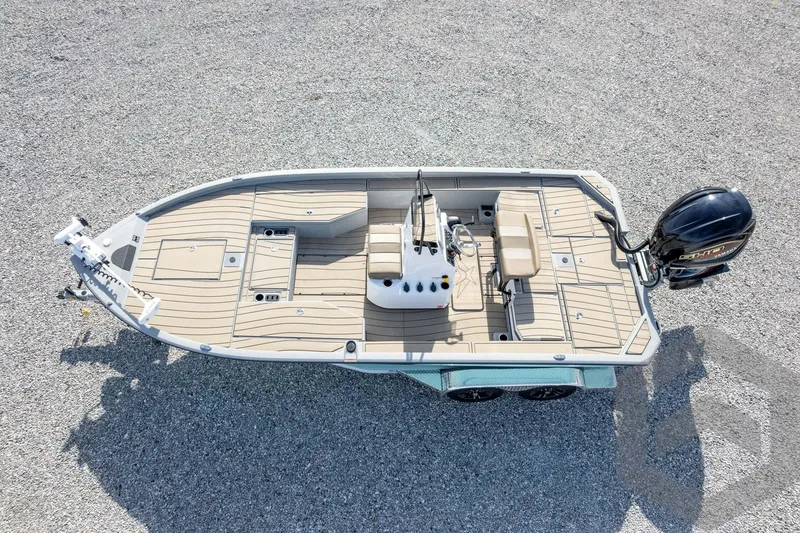 Slide: The Image of 2026 Vexus ACX 2150 boat, aerial view, beige deck, dual seats, outboard motor. - 52
