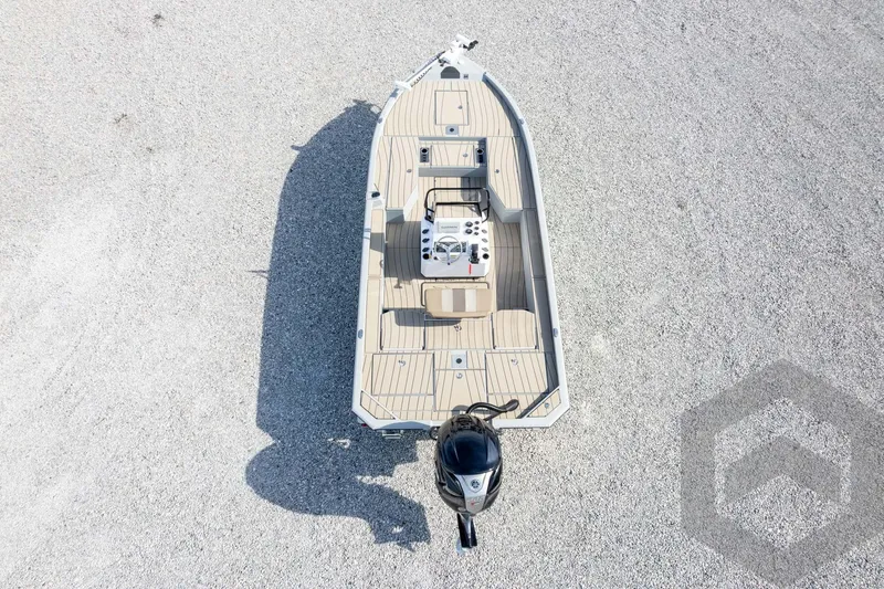 Slide: The Image of Top view of 2026 Vexus ACX 2150 boat on gravel surface. - 54
