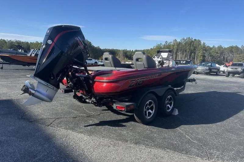 Slide: The Image of 2026 Nitro Z18 Pro boat with powerful outboard motor, parked on a trailer. - 5