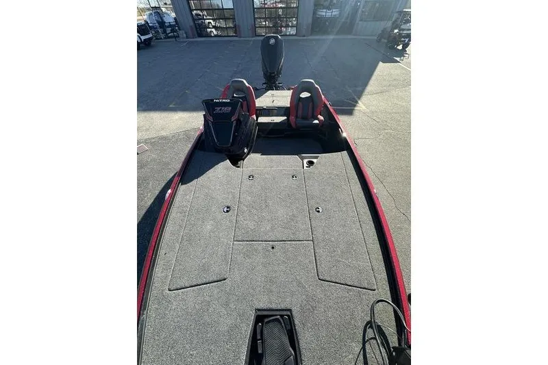 Slide: The Image of 2026 Nitro Z18 Pro boat interior with dual seats and spacious deck. - 9