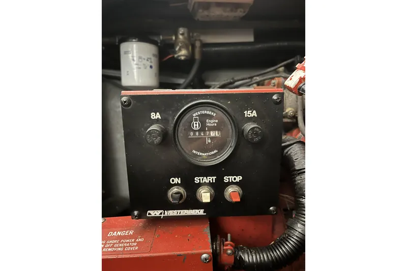 Slide: The Image of Control panel of a 1996 Sea Ray Sundancer 330 boat engine, showing engine hours. - 5