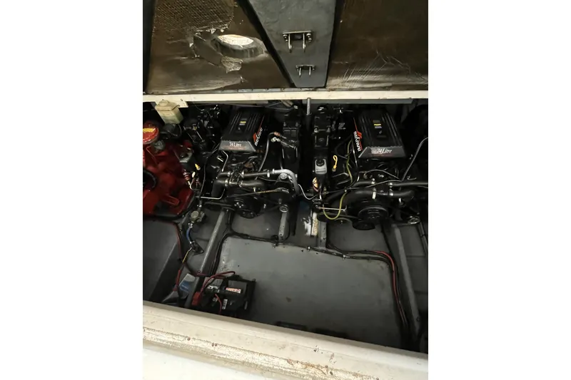 Slide: The Image of Engine compartment of 1996 Sea Ray Sundancer 330 with dual 7.4L engines. - 6