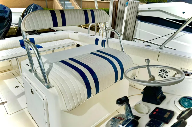 Slide: The Image of Storage compartment with drawers on a 1996 Marlin 35 CC Sportfish boat. - 11