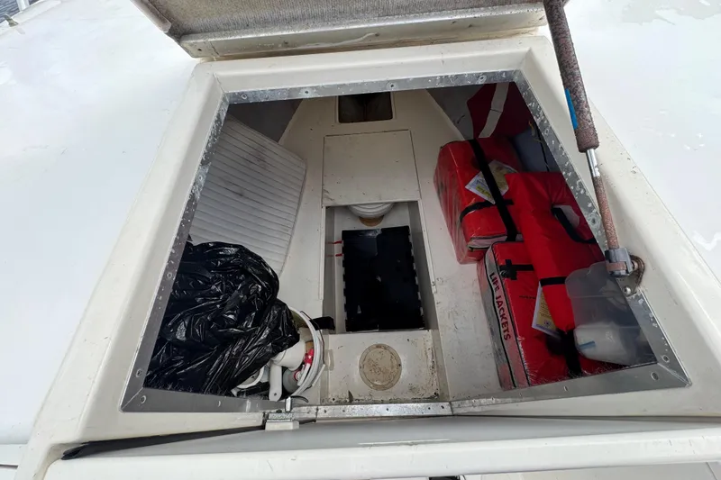 Slide: The Image of 1996 Marlin 35 CC Sportfish boat deck with storage and speakers. - 29