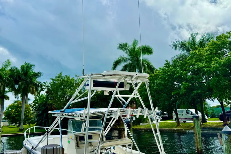 Slide: The Image of Open storage compartment on 1996 Marlin 35 CC Sportfish boat, showing rust stains inside. - 30