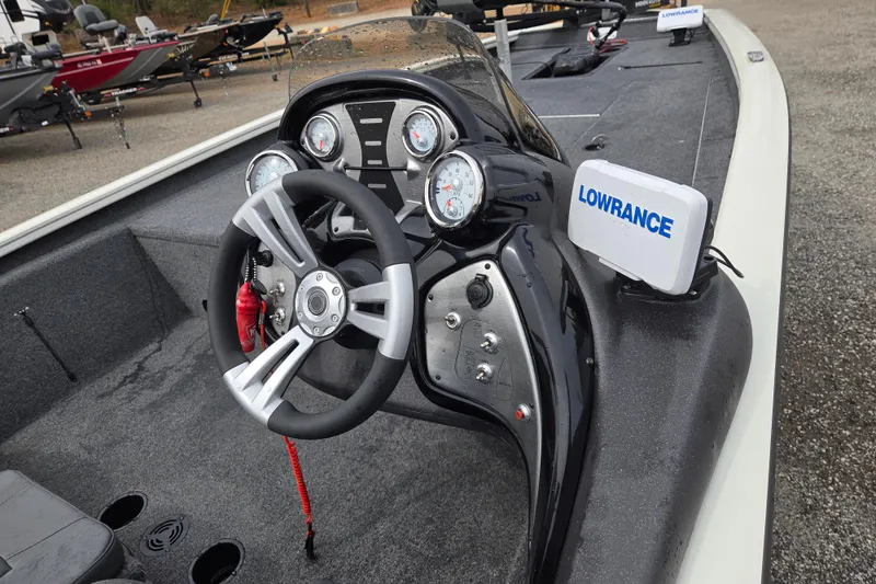 Slide: The Image of 2021 Tracker Pro Team 190 TX boat dashboard with steering wheel and Lowrance device. - 7