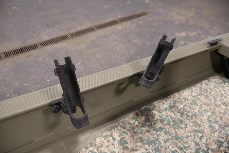 Slide: The Image of 2022 Tracker Grizzly 2072 MVX CC boat rod holders on deck. - 31