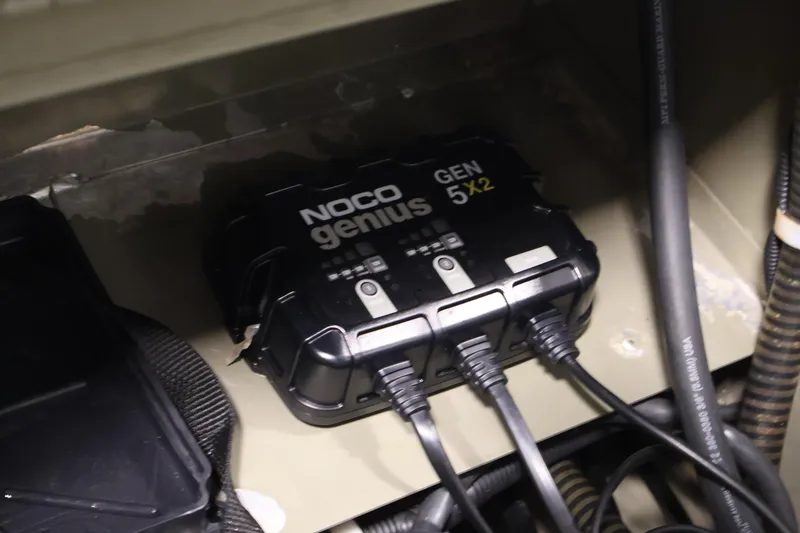 Slide: The Image of NOCO Genius GEN5X2 battery charger in 2022 Tracker Grizzly 2072 MVX CC boat. - 33