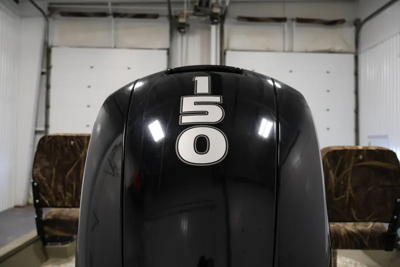 Slide: The Image of 2022 Tracker Grizzly 2072 MVX CC boat engine with "150" horsepower label. - 38