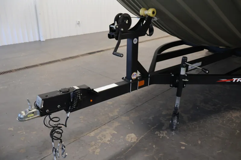 Slide: The Image of Trailer hitch of 2022 Tracker Grizzly 2072 MVX CC boat in a garage setting. - 40