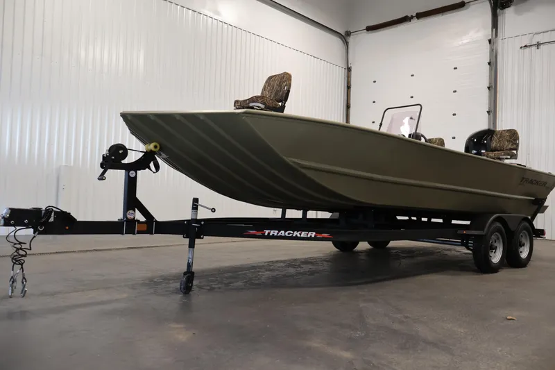Slide: The Image of 2022 Tracker Grizzly 2072 MVX CC boat on trailer in indoor setting. - 41