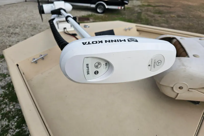 Slide: The Image of Minn Kota Riptide motor on 2022 G3 Bay 17 boat, outdoor setting. - 14
