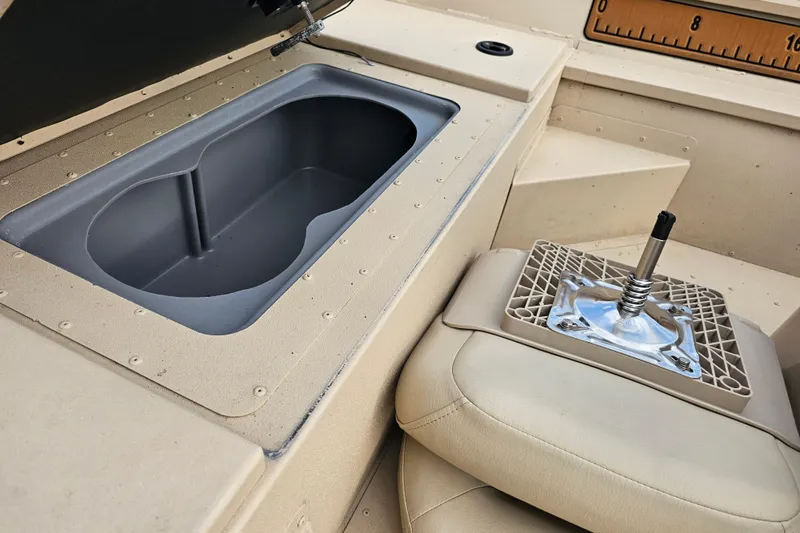 Slide: The Image of Interior of 2022 G3 Bay 17 boat showing storage compartment and seat base. - 15