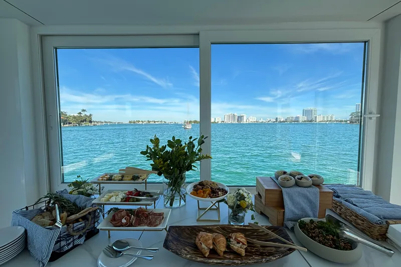Slide: The Image of Floating dining experience in ARKHAUS Villa 50, 2025, with stunning waterfront view. - 15
