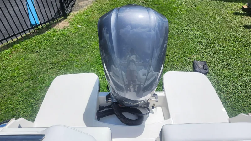 Slide: The Image of 2026 Regal LX4 boat engine on grassy background, viewed from above. - 13