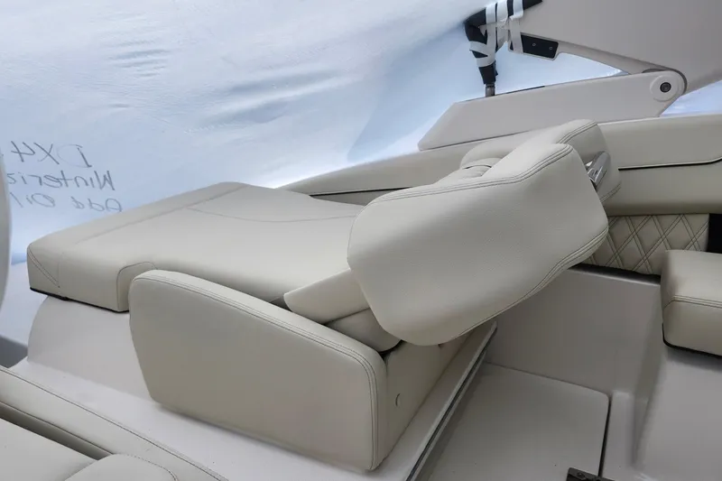 Slide: The Image of Luxurious interior seating of 2026 Regal LX4 boat with elegant white upholstery. - 15