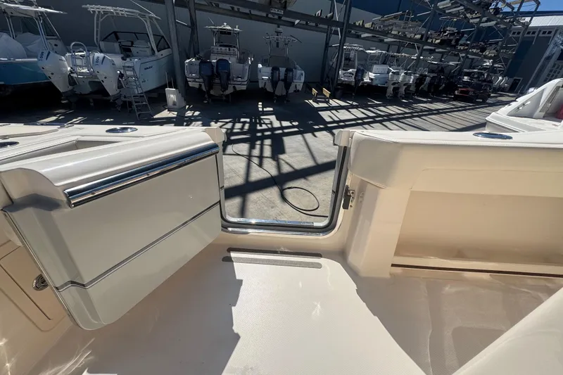 Slide: The Image of 2024 Grady-White Canyon 336 boat interior, showcasing sleek design and spacious layout. - 26