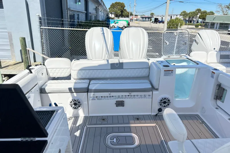 Slide: The Image of 2025 Sea Fox 288 Traveler boat interior with seating and storage compartments. - 21