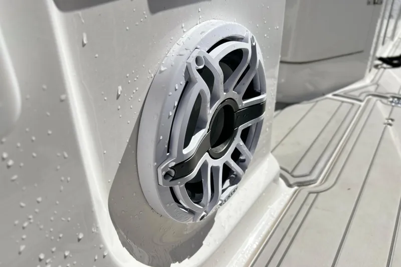 Slide: The Image of Close-up of a speaker on a 2025 Sea Fox 288 Traveler boat, with water droplets. - 22