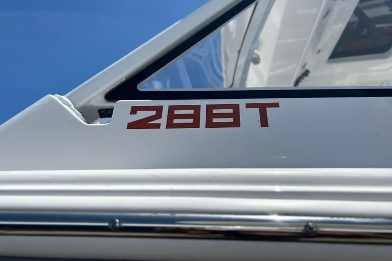 Slide: The Image of 2026 Sea Fox 288 Traveler boat detail with model number on white surface. - 33
