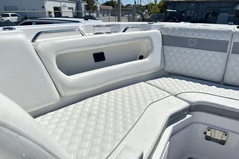 Slide: The Image of Luxurious seating on 2025 Sea Fox 288 Traveler boat, featuring diamond-stitched upholstery. - 7