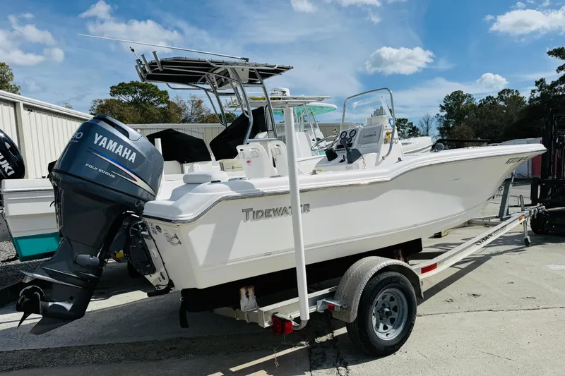 Slide: The Image of 2012 Tidewater 180 CC Adventure boat with Yamaha engine on trailer, outdoors. - 3