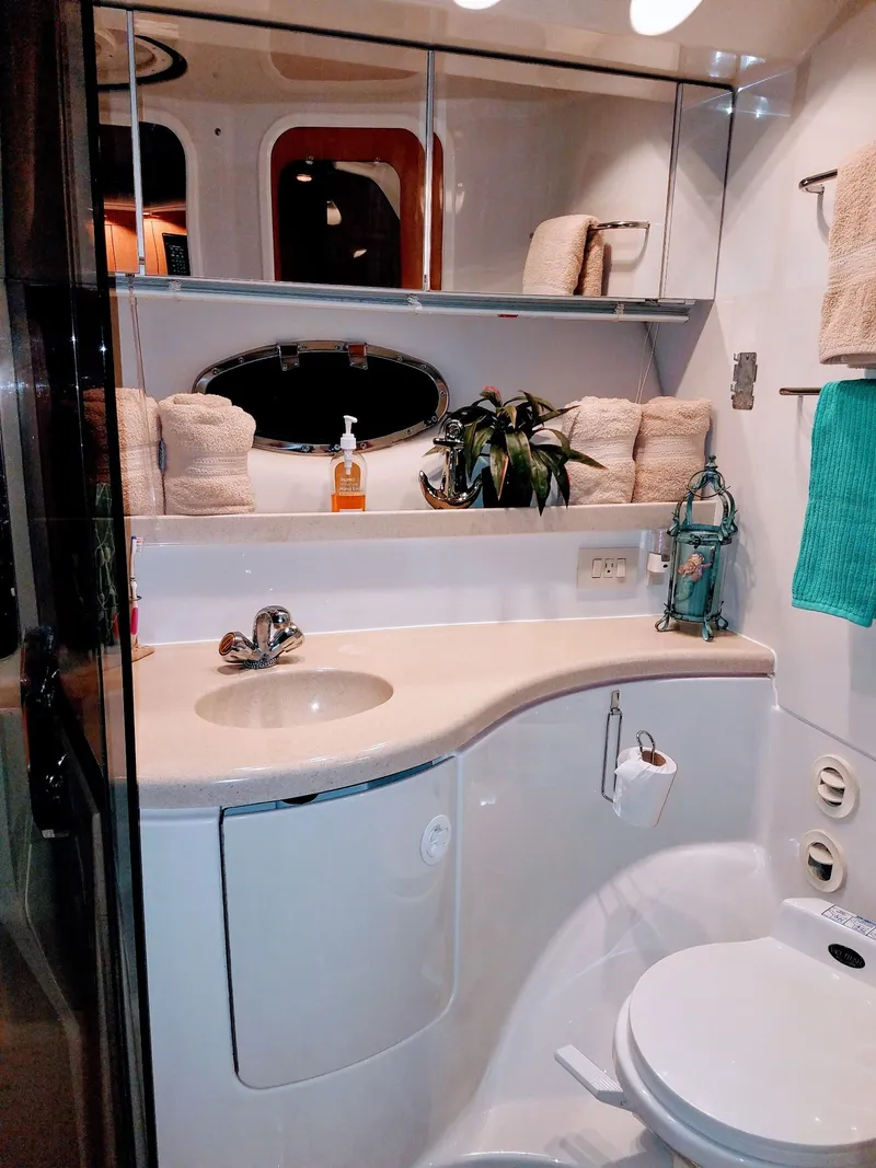 Slide: The Image of Bathroom in 2001 Regal 3780 boat with sink and toilet. - 6