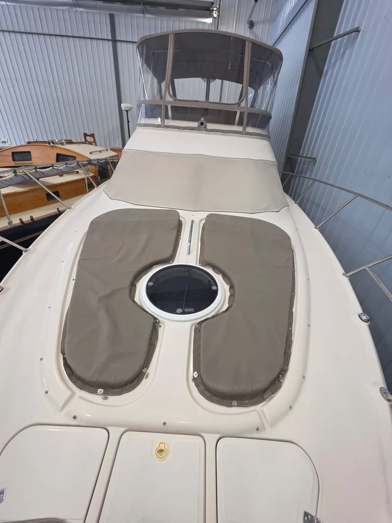 Slide: The Image of 2001 Regal 3780 yacht in storage facility. - 9