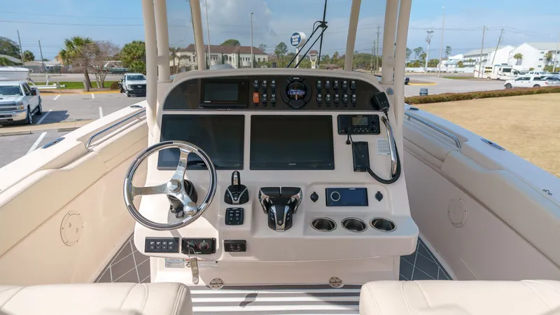 Slide: The Image of Helm console of 2022 Grady-White Canyon 306 boat. - 14