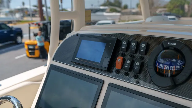 Slide: The Image of Grady-White Canyon 306 2022 boat console with navigation system. - 15
