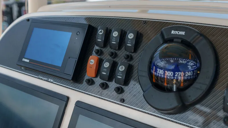 Slide: The Image of Dashboard of Grady-White Canyon 306 boat, year 2022. - 16