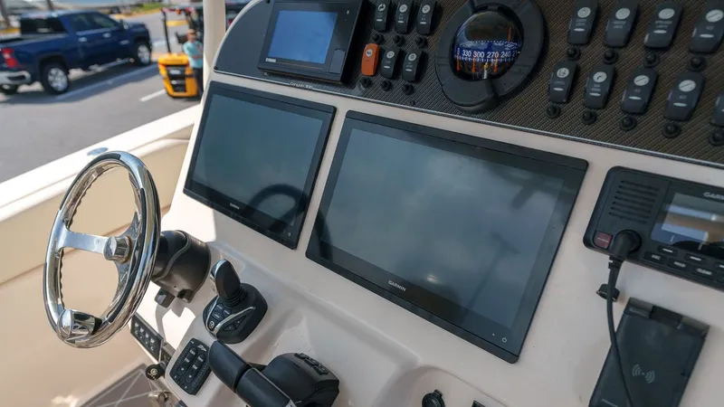Slide: The Image of Grady-White Canyon 306 2022 helm with modern displays. - 19