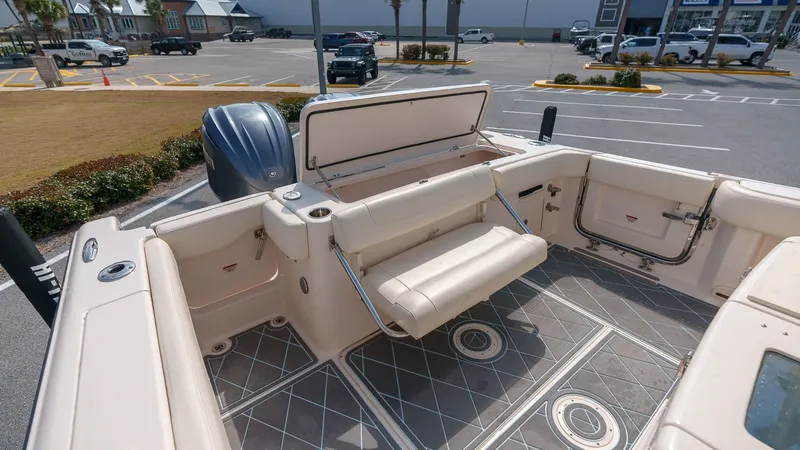 Slide: The Image of 2022 Grady-White Canyon 306 boat with rear seating area. - 32