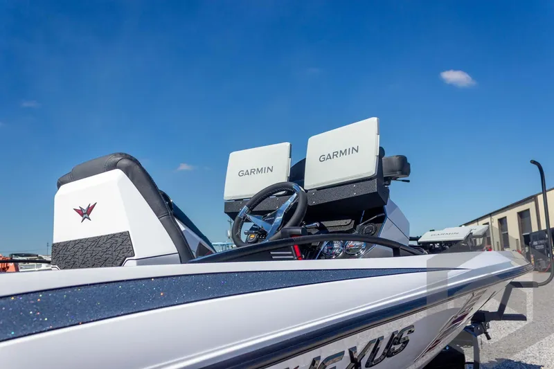 Slide: The Image of 2026 Vexus VXs20 boat with dual Garmin displays under a clear blue sky. - 19